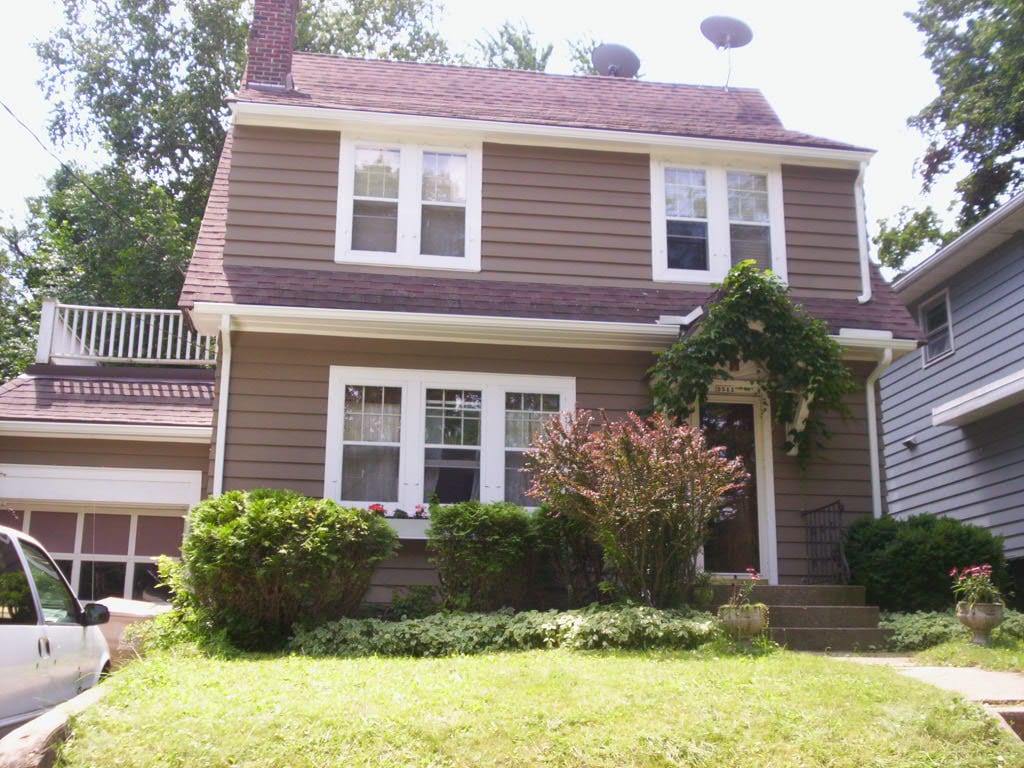 Madison Wisconsin Gutters and Downspouts on steep roof.