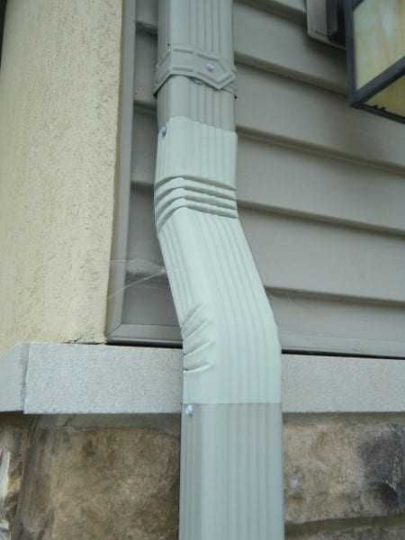 Downspout faded with mismatched paint